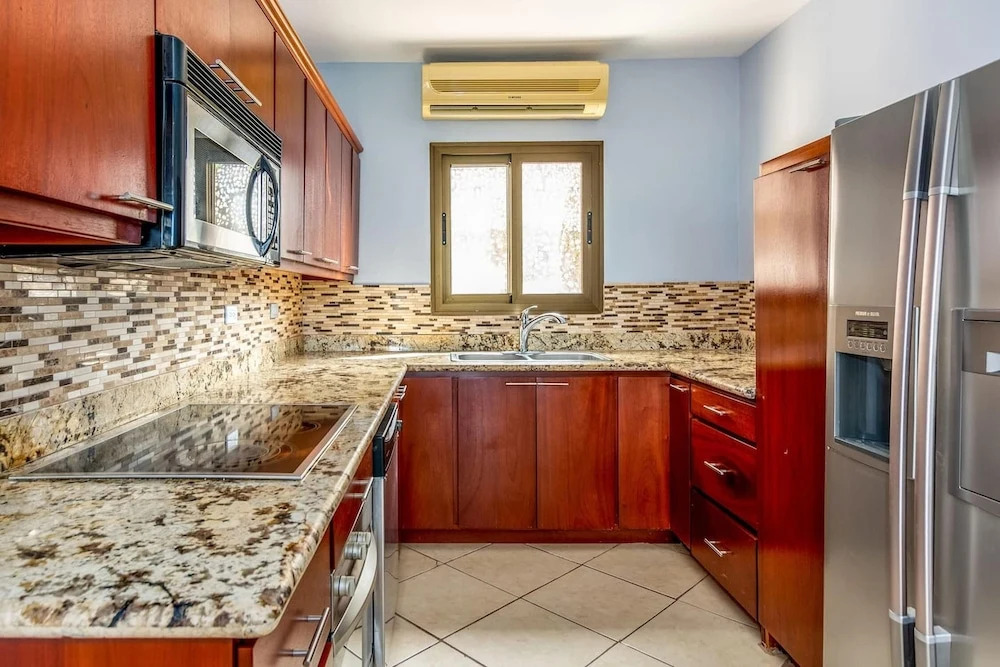 Elegant Oceanview Condo with Spacious Open-Concept Floor Plan and Inviting Beach Design