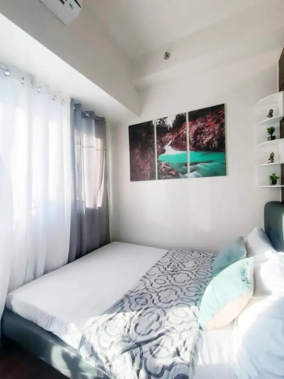 Fully Furnished 1 Bedroom at SMDC Air Residence with Balcony City View