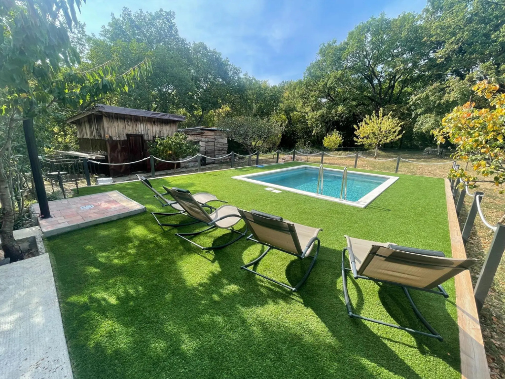 Vacation home with private swimming pool surrounded by nature