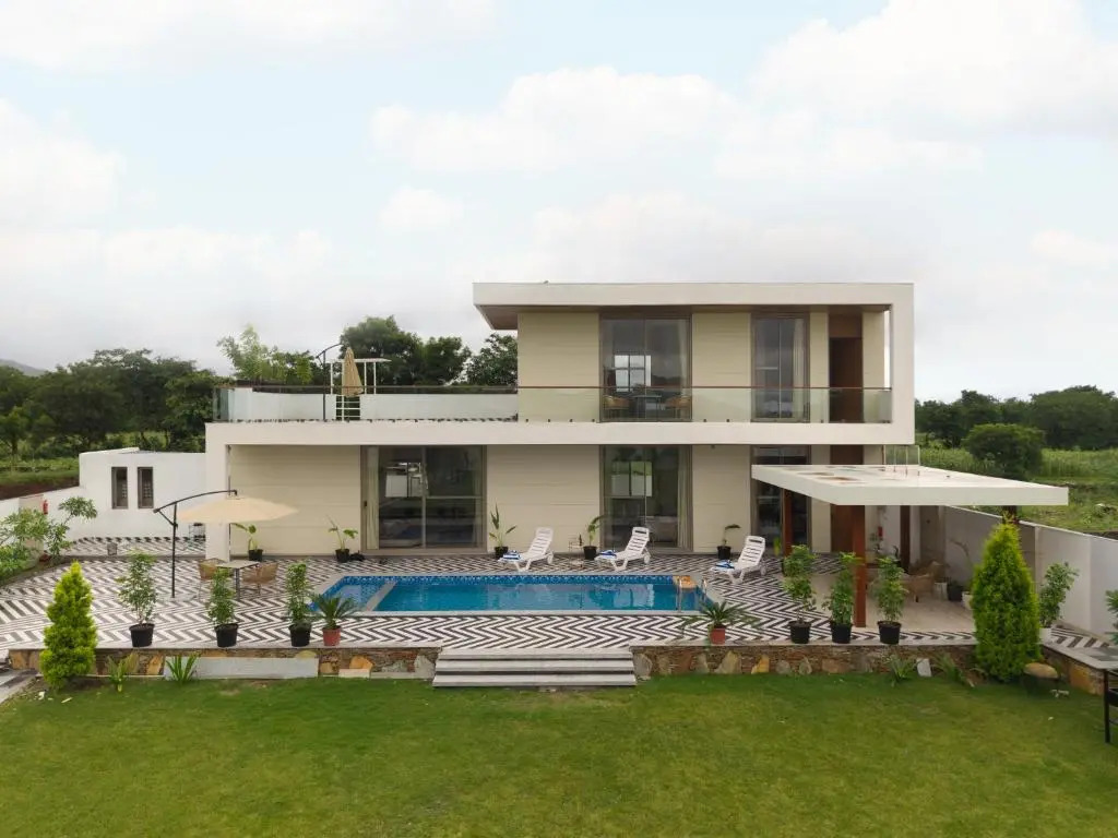 SaffronStays Raaga - luxury 4BR villa with private pool, lawns, gazebos & sweeping Aravalli hill vie