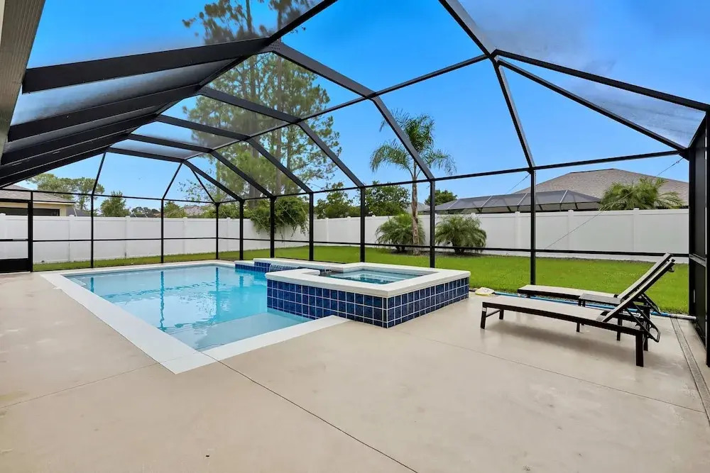 Modern 4BR Retreat Near Beach Heated Pool