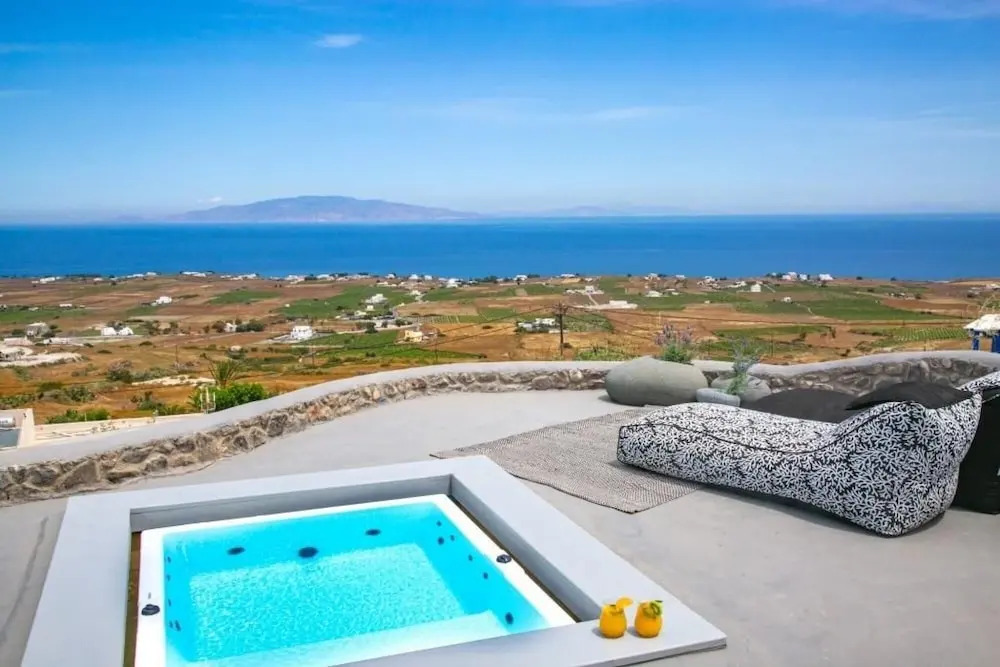 Elysian Santorini Oia Luxury Cave Villa With Outdoor Hot Tub With Sea Sunset View