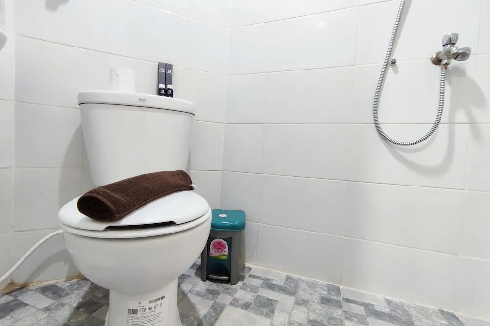 Homey 1BR without Living Room at Amartha View Apartment By Travelio