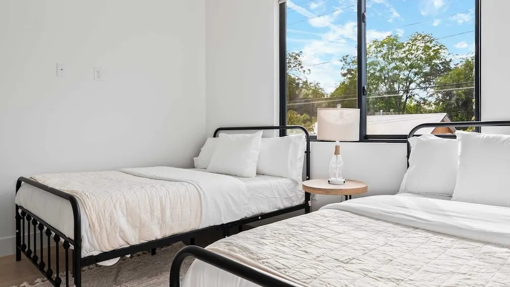 Stylish Home With Firepit & Balcony Steps From Austins Best Near Rainey St, Lady Bird Lake & Downtown The Ashlee by Avantstay