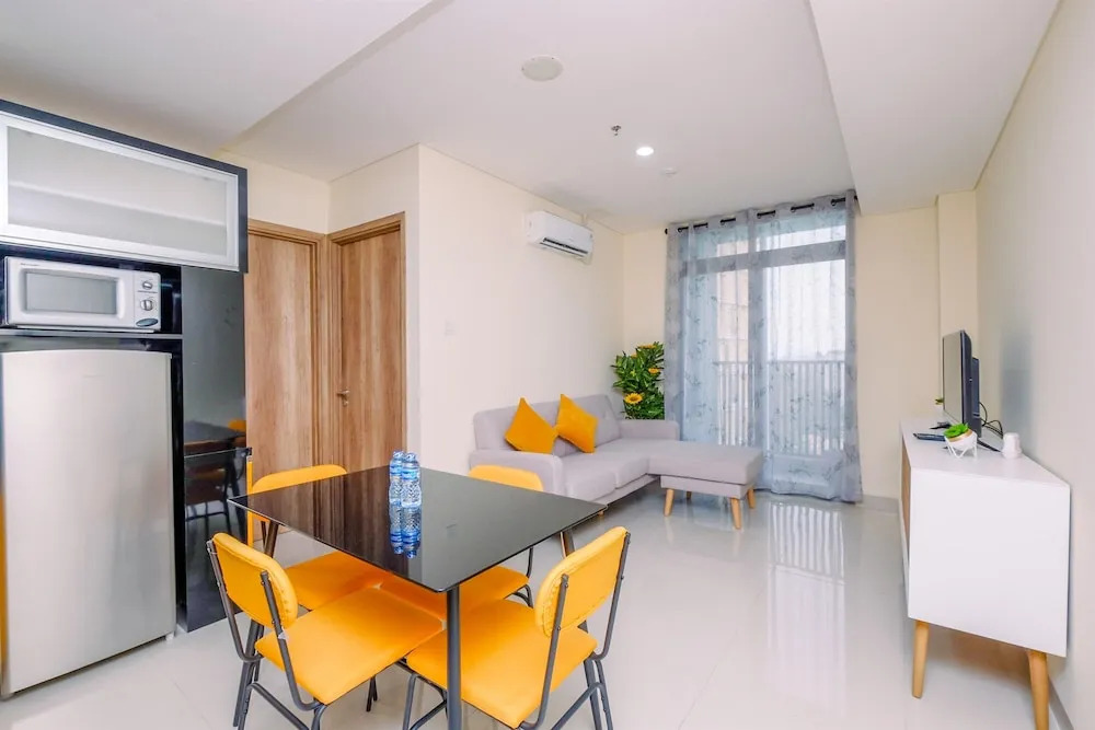 Homey and Fully Furnished 1BR Apartment at Pejaten Park Residence By Travelio