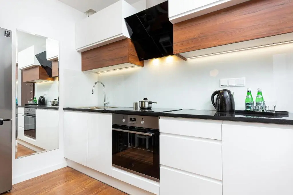 Royal City Center Mennica Residence by Noclegi Renters