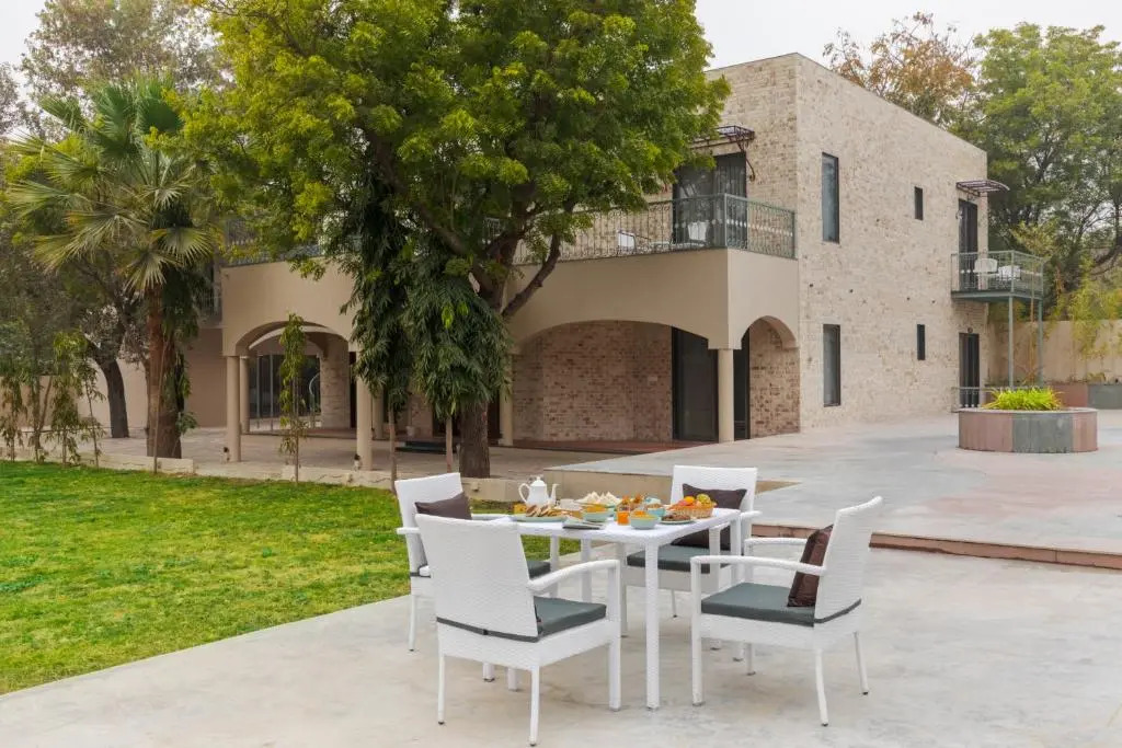 SaffronStays Pristine Manor - 8-BR Udaipur villa with private pool, garden, and event space near Fateh Sagar Lake