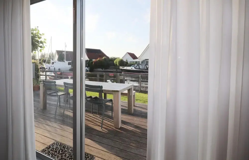 Nice Holiday Home on the Water in Grou