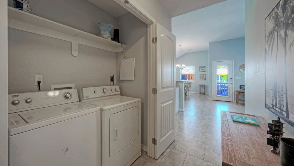Bright Coastal Escape w/ Games, Swing Chairs & Minutes to Port A Beach Captain Kirk by Avantstay