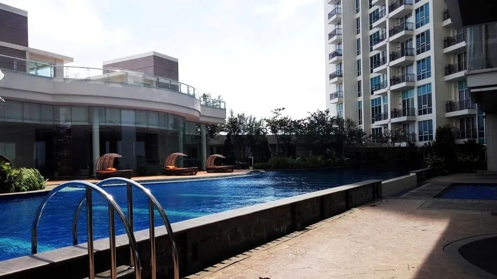 Family Studio Room at Ancol Mansion Apartment By Travelio