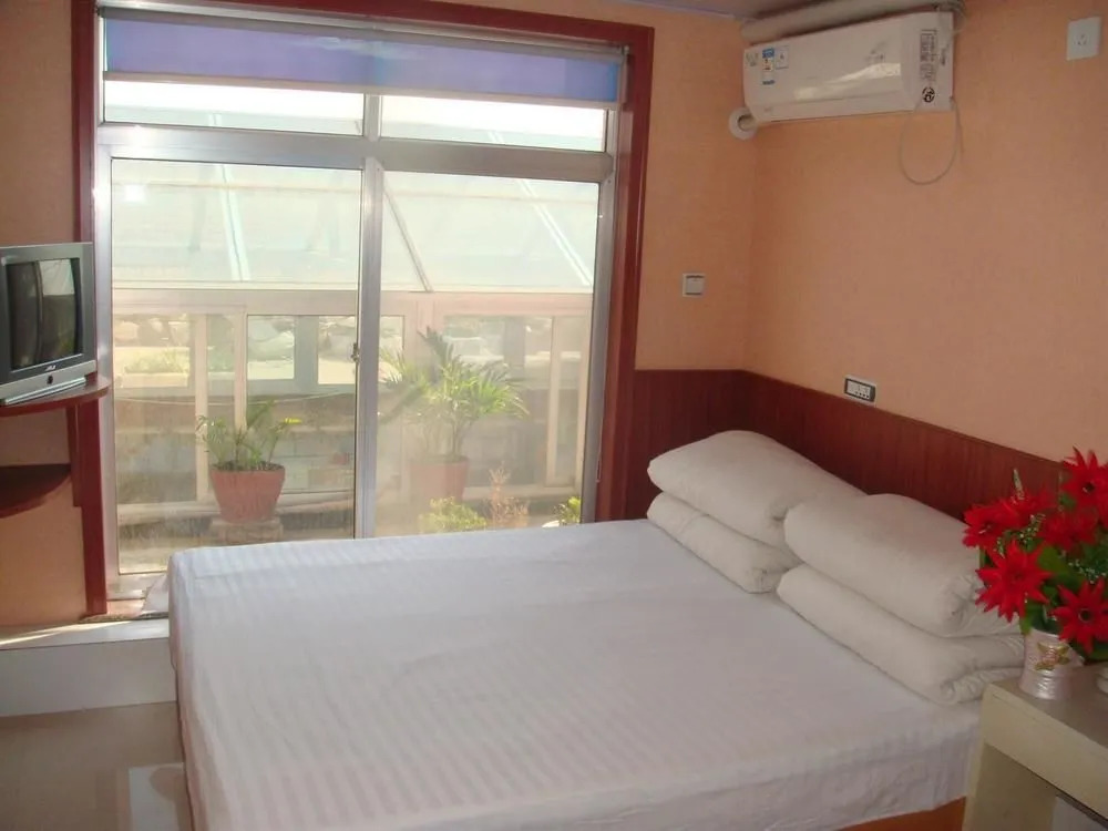 Penglai Maosheng Yujia Apartment(蓬莱茂盛渔家公寓)