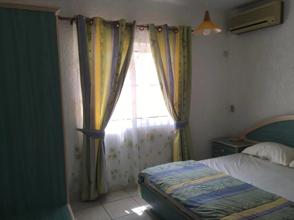 2 bedrooms appartement at Flic en Flac 500m away from the beach with shared pool enclosed garden and wifi
