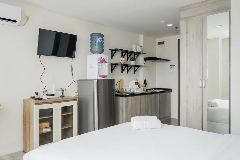 Compact and Monochrome Studio Room Bintaro Icon Apartment