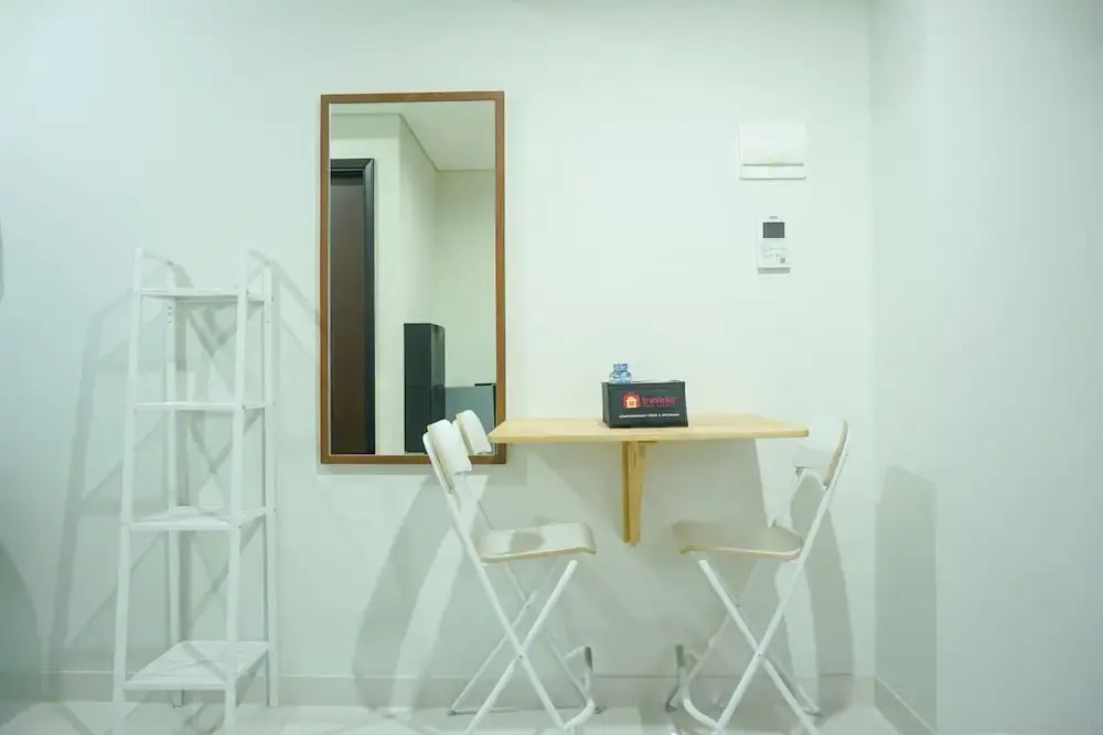 Strategic Location 1BR Apartment @ Puri Mansion near Puri By Travelio