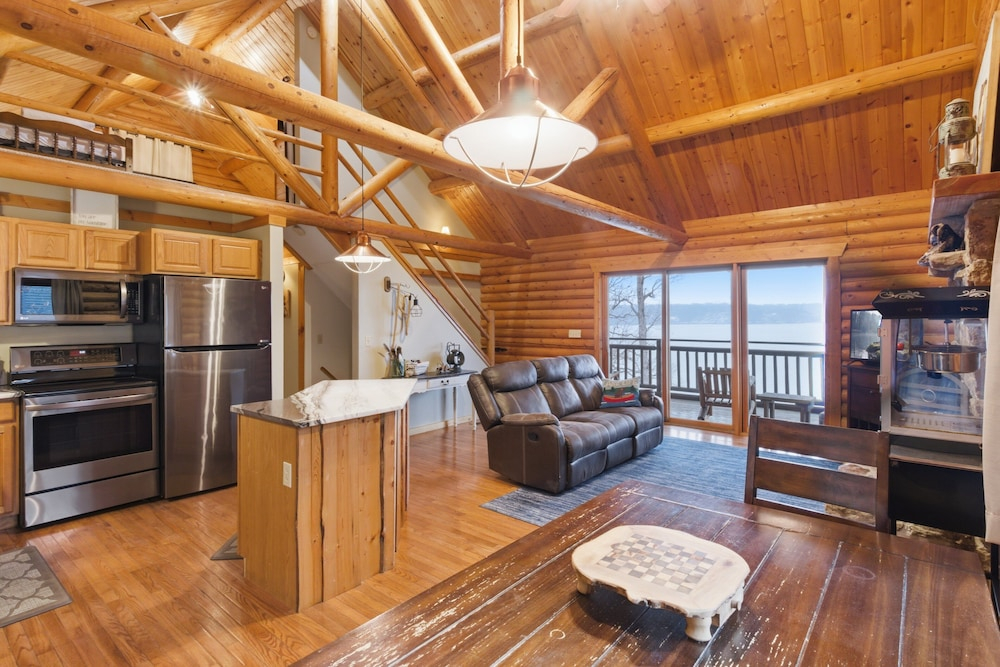 Lakefront Log Cabin With Private Dock, Two Decks & Cozy Comfort at 35mm in Sunrise Beach