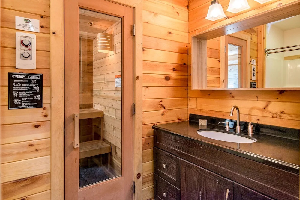 Modern Cedar Log Cabin w Hot Tub by RedAwning