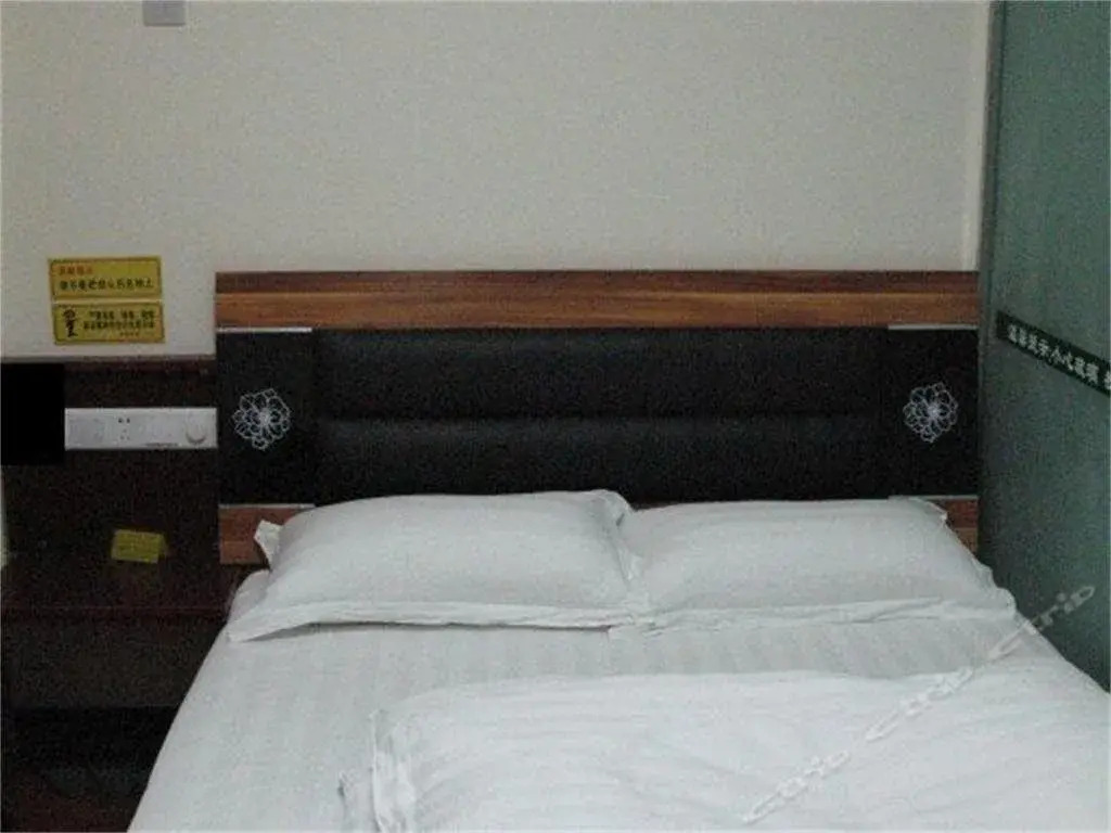 Anxian Longfeng Business Hotel