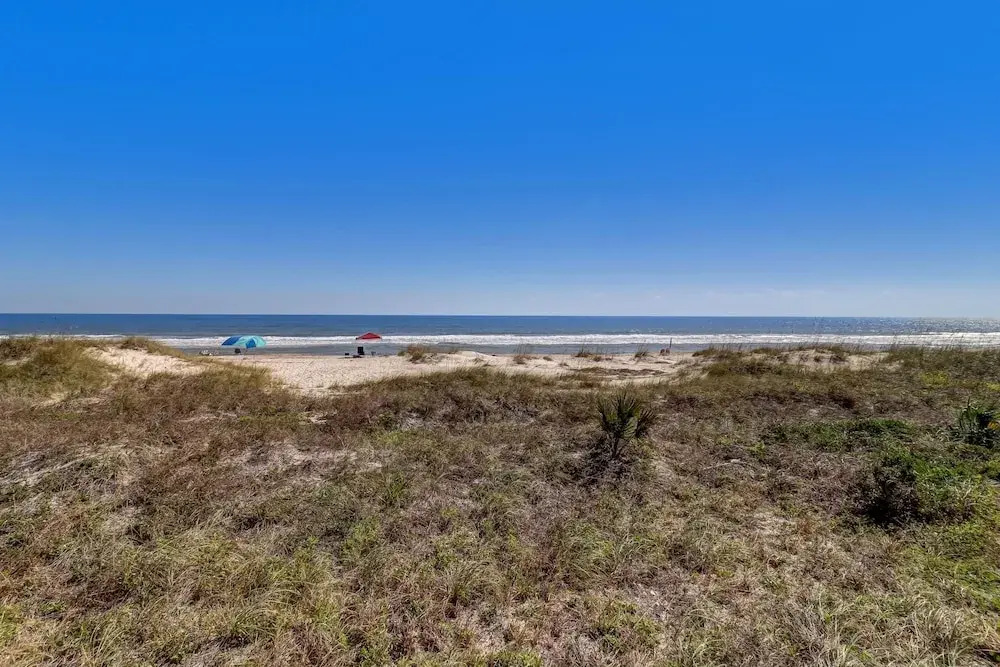 Beach Style Condo Includes Google Mini Home And Beach Access 2 Bedroom Condo by RedAwning