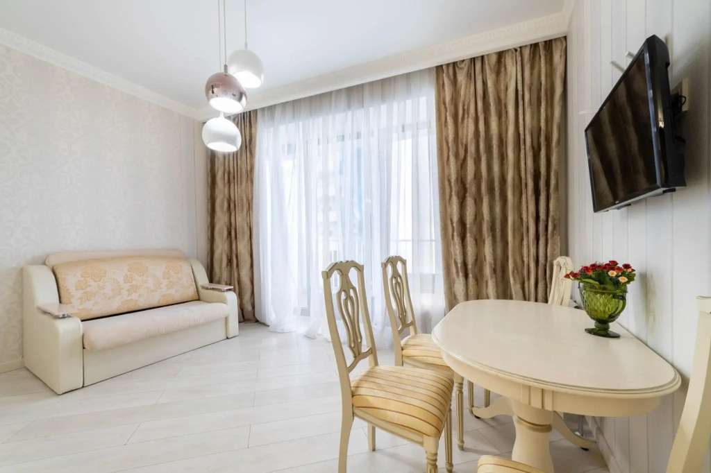 Real Apartments (Риал Апартментс) на проспекте Курортный 105