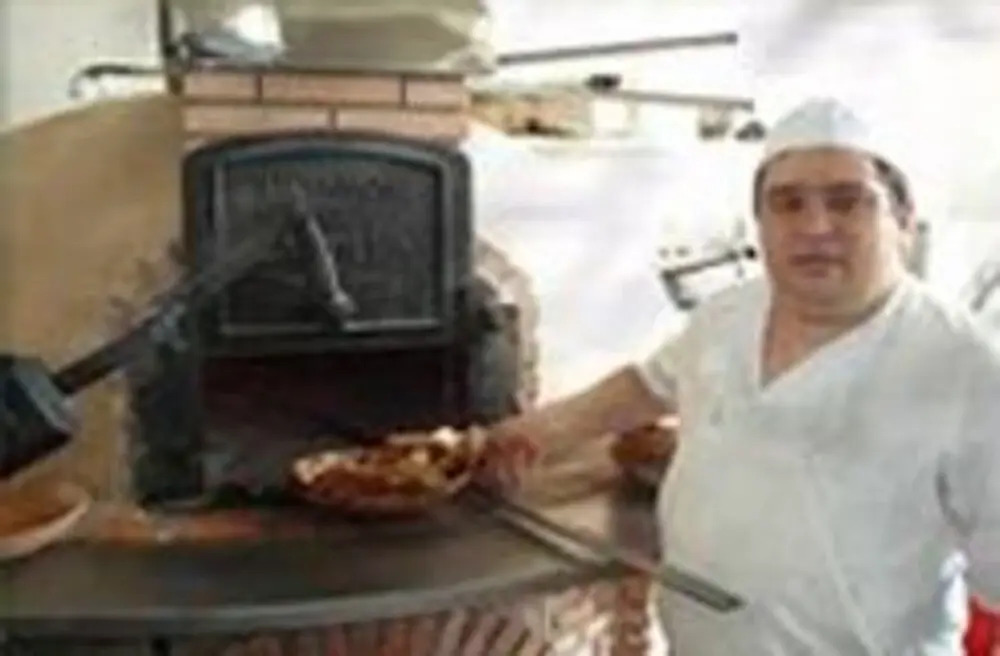 Hotel Asador H.M. Versus