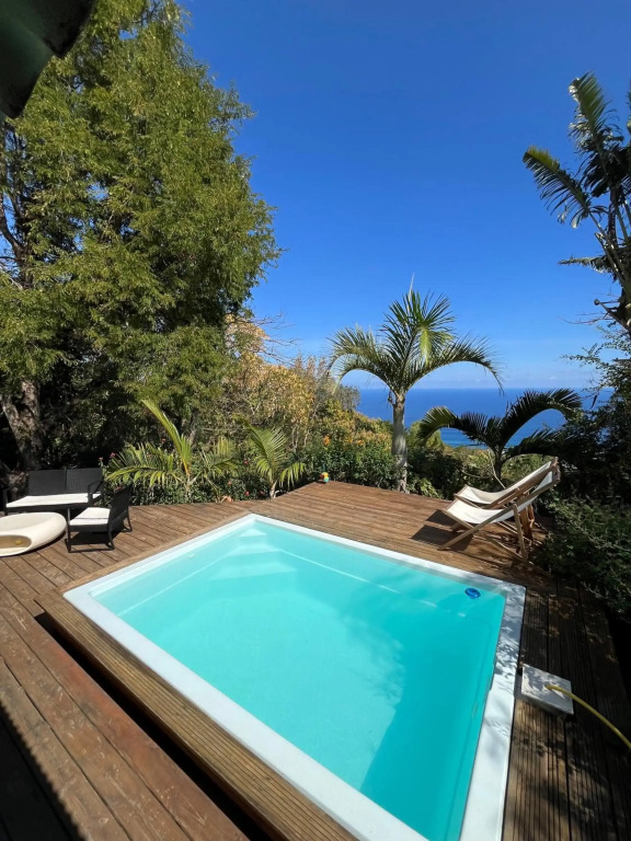 Cottage chaleureux avec vue mer et piscine