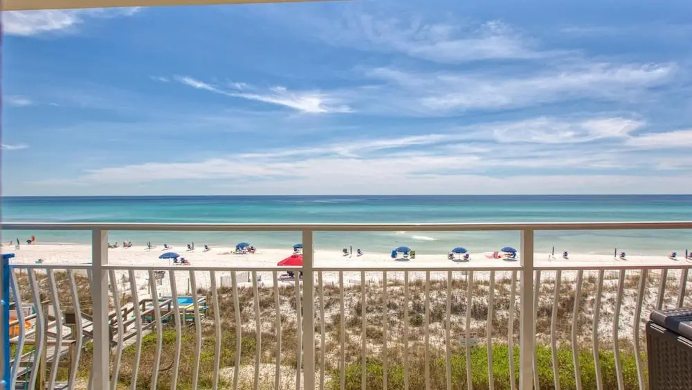 Crystal Villas 6A - Just a few steps and your toes will be in the sand with Beach Service Included