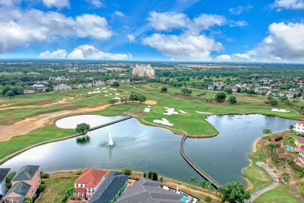 Top-floor 2BR Condo With Golf Course Views, Garage & Reunion Resort Amenities