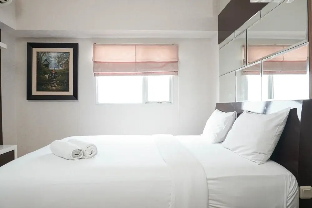 Strategic Location 1BR The Wave Apartment with City View