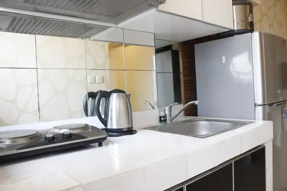 Homey 2BR Apartment at Sudirman Suite