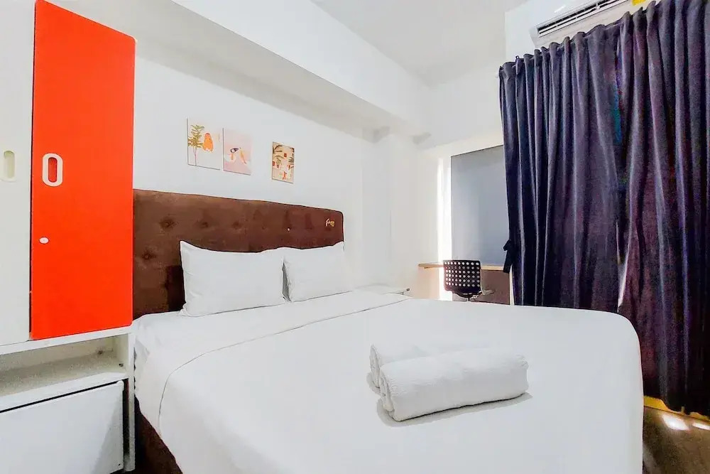 Modern Studio M-Town Residence Apartment near Shopping Mall By Travelio