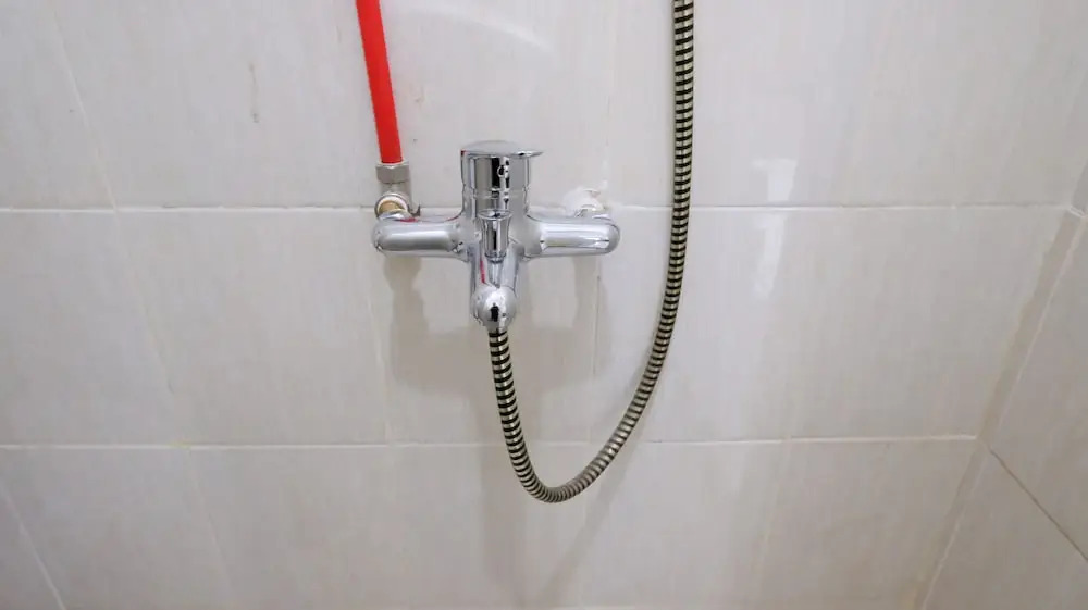 Homey 2BR at Puncak Permai Apartment By Travelio