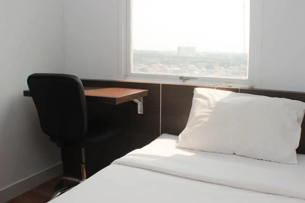 Homey And Minimalist 2Br At Patraland Urbano Apartment