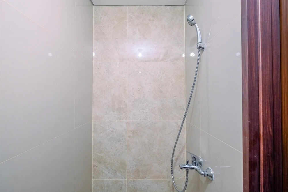 Warm And Minimalist Studio Room Transpark Cibubur Apartment