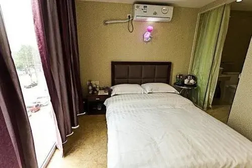 Xinyijia City Hotel