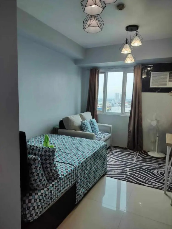 Cozy Studio Unit in Quezon City With Private Pool and City Views