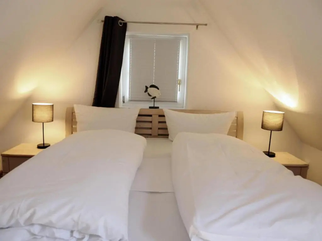 Neuerbautes Haus im Friesenstil. Moderne 2-Zimmer-Appartements mit Balkon für bis zu 4 Personen