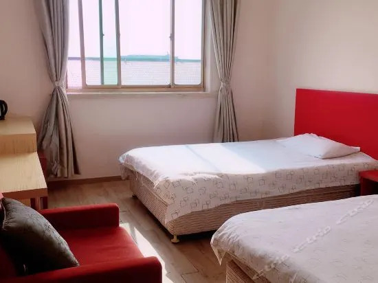 Xin Cheng Hotel (Shanghai Bay University Town Branch)