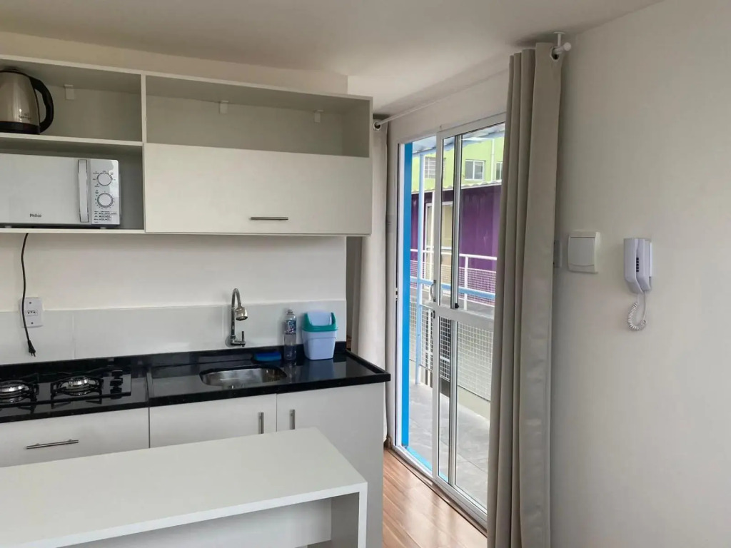 Loft container central c/ estacionamento