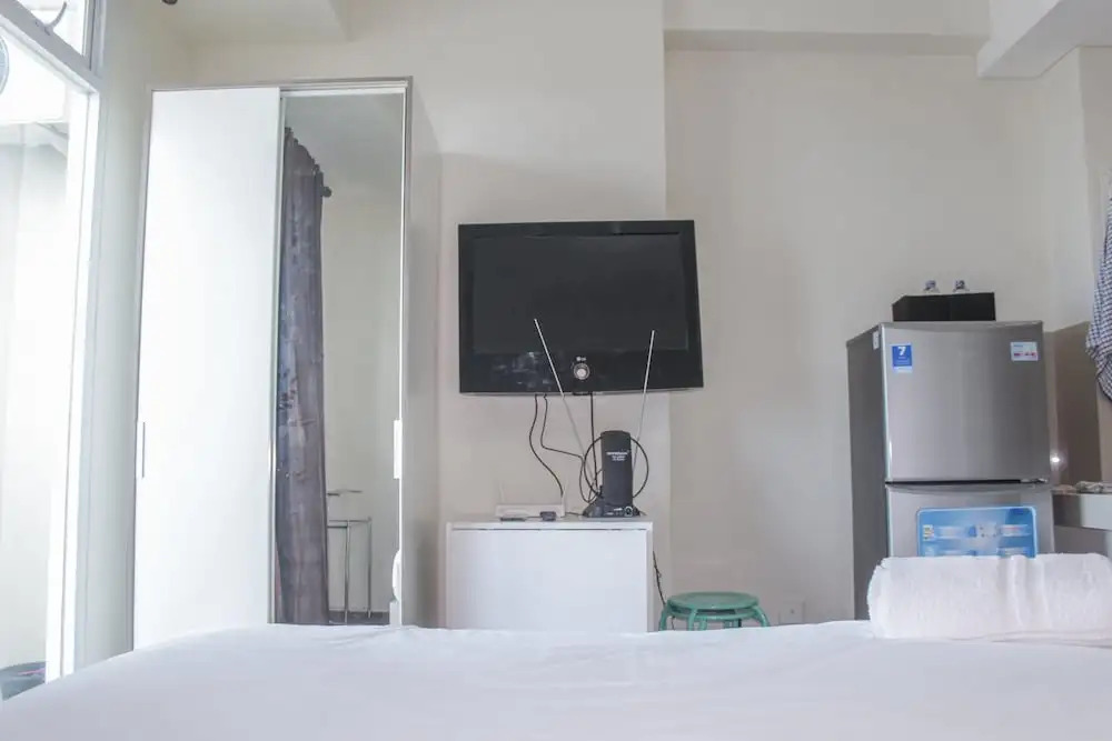 Homey Studio with City View Apartment @ Puri Orchard