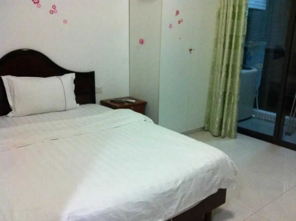 Huamei Apartment Hotel