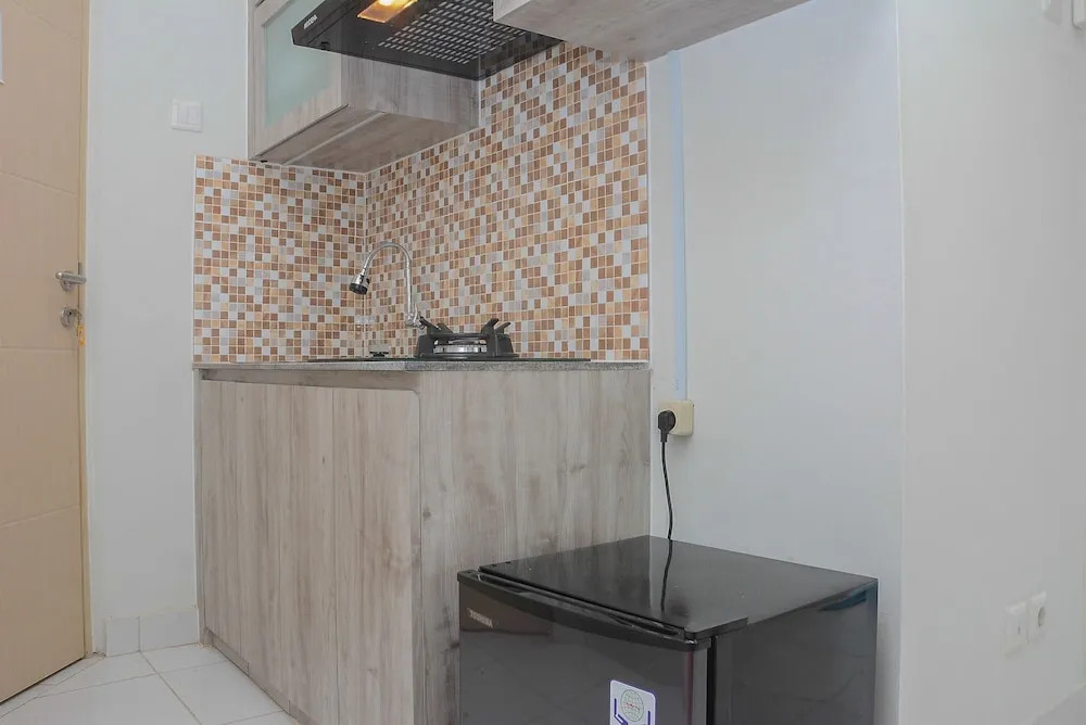 Comfy and Minimalist Studio at Amethyst Apartment