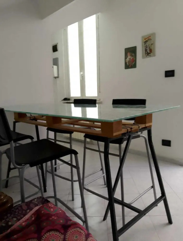 Spacious and Naturally Bright Bomboniera Rooftop Favors Apartment