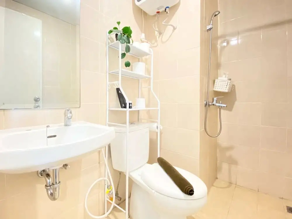 Bright and Private 2BR Apartment at Parahyangan Residence near Nara Park By Travelio