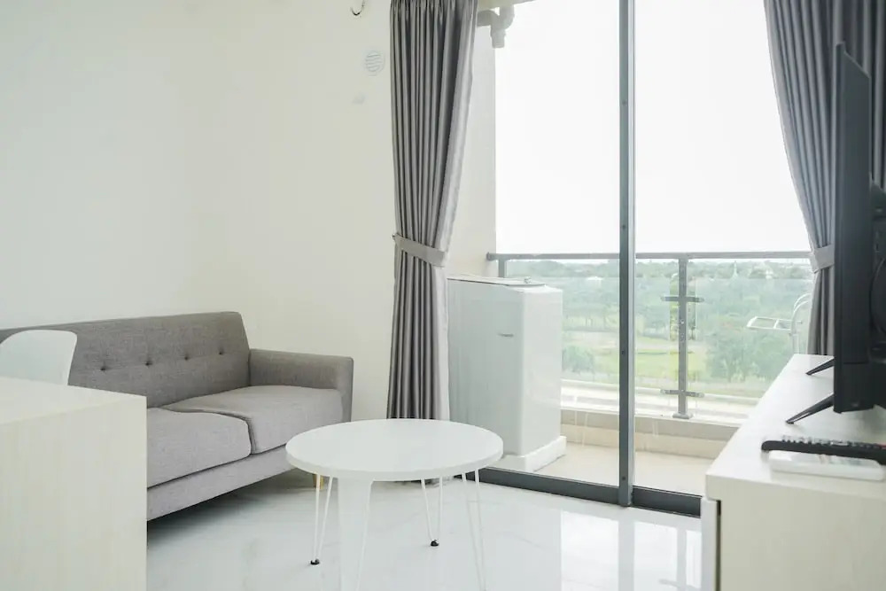 Comfortable Design 2BR with Washing Machine Sky House BSD Apartment By Travelio