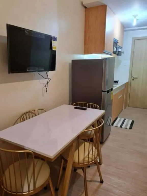 OYO 936 Yumis Condotel Trees Residences