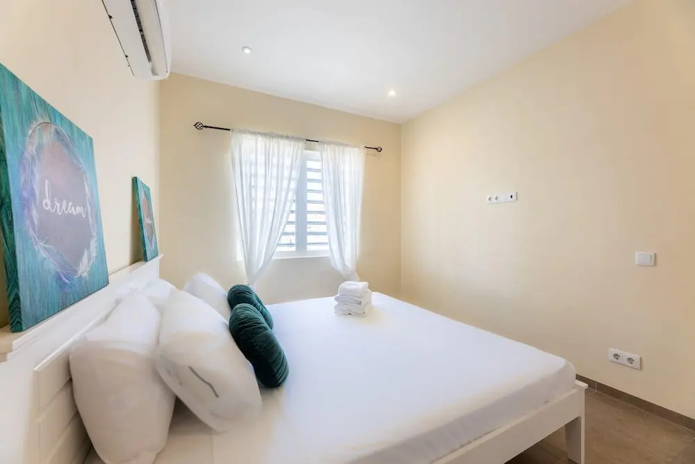 Charming 2BR Apt With Tropical Garden Pool