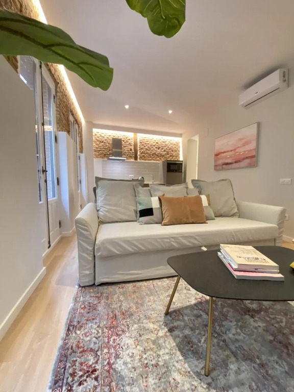 Collection Latina - Apartamentos Únicos en el Barrio Más Auténtico