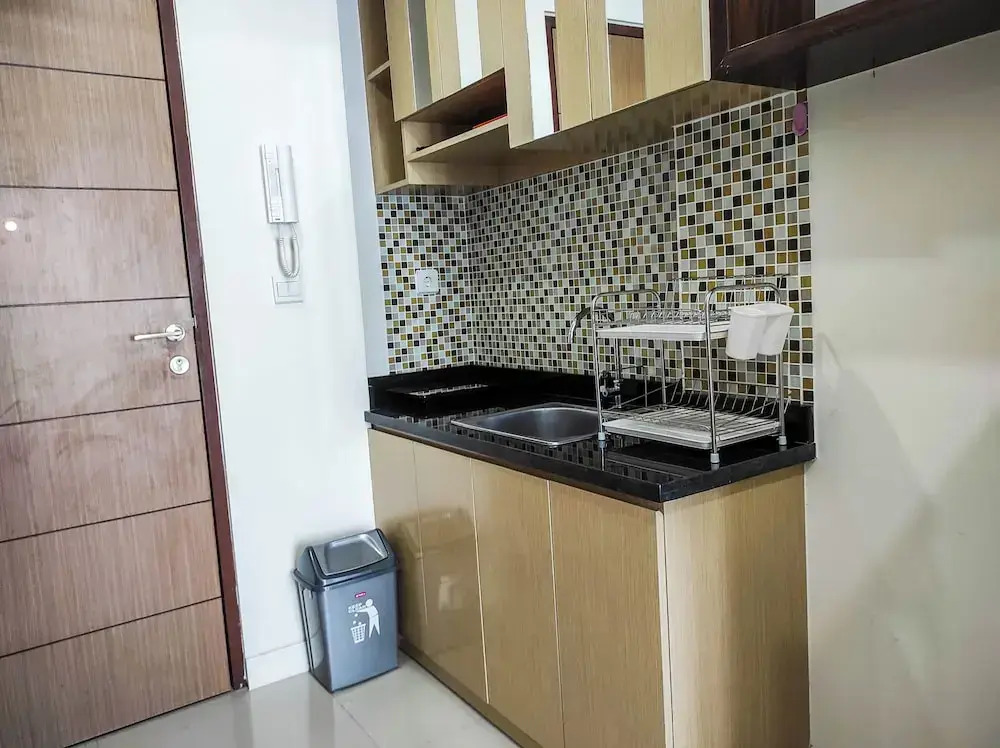 Luxurious 1BR at Vida View Makassar Apartment By Travelio