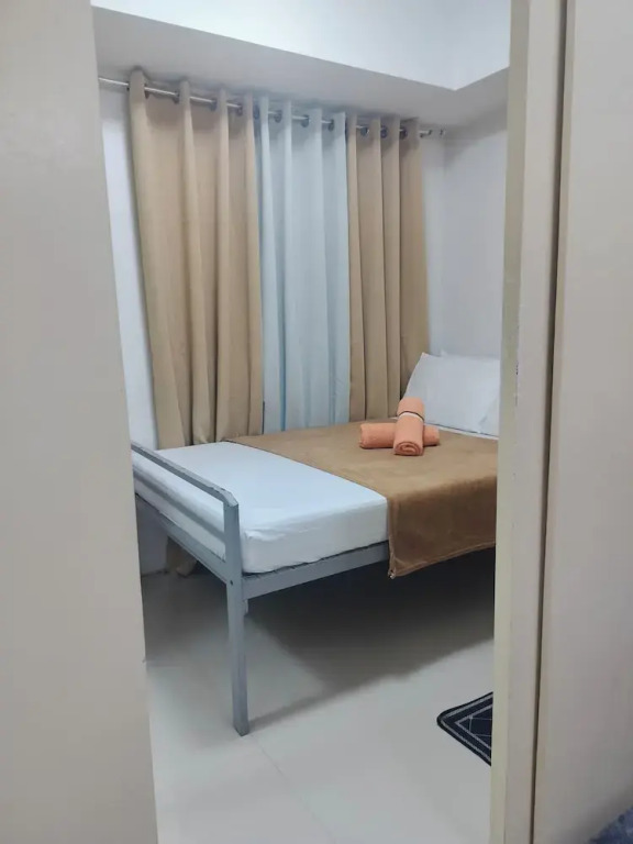 Cozy Quezon City Condo With Private Pool w Elevator Access