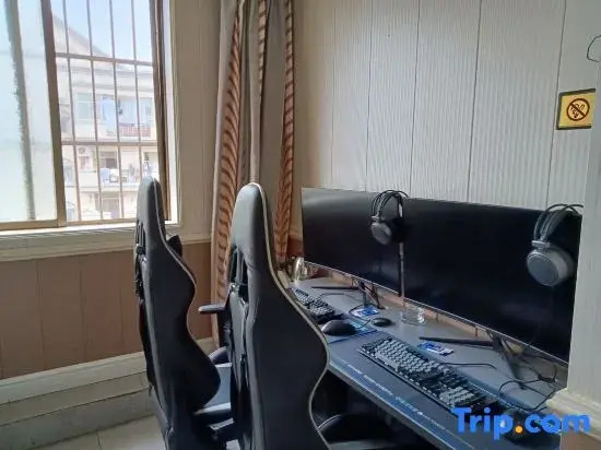 X9 E-sports Movie Homestay (Guanggu Plaza)